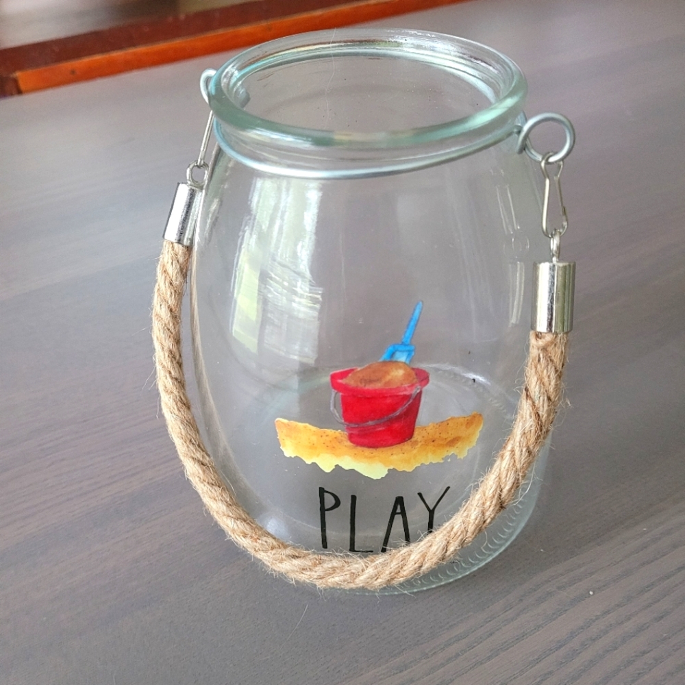 Rae dunn hanging sand bucket hurricane glass